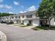 View of the townhome exteriors, showcasing the architecture and curb appeal at 5225 Big Bass Dr, Raleigh, NC 27610