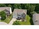 Desirable residence featuring attached two-car garage, manicured lawn, and basketball hoop at 534 Siltstone Pl, Cary, NC 27519