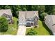Charming home with well-maintained lawn, two car garage, and inviting front porch at 534 Siltstone Pl, Cary, NC 27519