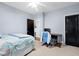 Comfortable bedroom featuring a desk, ceiling fan, and carpet floors at 534 Siltstone Pl, Cary, NC 27519