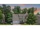 Charming two-story home with a well-kept lawn, mature tree, and convenient two-car garage at 534 Siltstone Pl, Cary, NC 27519