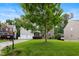 Lovely two-story home with a manicured lawn, mature tree, and a welcoming two-car garage at 534 Siltstone Pl, Cary, NC 27519