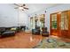 Inviting living room features a cozy fireplace, plush seating, and expansive windows for natural light and views at 534 Siltstone Pl, Cary, NC 27519