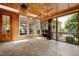 Bright and spacious sunroom boasts wood ceilings, skylights and tile floors with views of the backyard at 534 Siltstone Pl, Cary, NC 27519