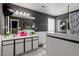 Bathroom featuring a vanity with dual sinks, a mirror, and a bathtub at 6001 Winged Willet Ct, Wendell, NC 27591