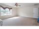 Spacious bedroom featuring carpeted flooring and a ceiling fan for added comfort at 6001 Winged Willet Ct, Wendell, NC 27591
