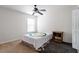 Cozy bedroom with a single bed, ceiling fan, and natural light at 6001 Winged Willet Ct, Wendell, NC 27591