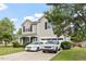Beautiful two-story home with a well-maintained lawn, a welcoming front porch, and a spacious driveway at 6001 Winged Willet Ct, Wendell, NC 27591
