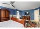 Well-lit main bedroom with ample space, featuring a ceiling fan and closet at 6001 Winged Willet Ct, Wendell, NC 27591