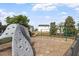 Neighborhood playground features a climbing wall, swing set, and slide surrounded by a secure fenced area at 6001 Winged Willet Ct, Wendell, NC 27591