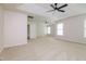 Large main bedroom with carpet floors, modern ceiling fan, and ample space at 616 Cheselden Dr, Durham, NC 27713