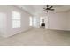 Spacious main bedroom with a tray ceiling, carpet flooring, and an ensuite bathroom at 616 Cheselden Dr, Durham, NC 27713