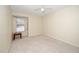 Light-filled bedroom features ceiling fan and neutral decor at 6213 Fountainhead Dr, Raleigh, NC 27609