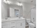 Bathroom featuring double vanity, toilet, and shower at 6549 Tremolo Trl, Raleigh, NC 27616