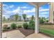 Cozy front porch view with lush landscaping and neighborhood street views; ideal for relaxing outdoors at 6549 Tremolo Trl, Raleigh, NC 27616
