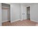 This bedroom features two closets and updated paint and trim at 658 Love Grove Church Rd, Sanford, NC 27332