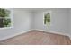 This bedroom features a window for natural light, updated paint and trim, and vinyl floors at 658 Love Grove Church Rd, Sanford, NC 27332