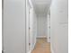 Bright hallway with fresh paint, neutral tones, and new wood-look flooring at 658 Love Grove Church Rd, Sanford, NC 27332