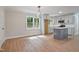 Modern kitchen with gray cabinets, island, and updated appliances, perfect for cooking and entertaining at 658 Love Grove Church Rd, Sanford, NC 27332