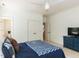 Inviting bedroom with cozy furnishings, en-suite bathroom, and closet for ample storage at 709 Skymont Dr, Holly Springs, NC 27540
