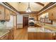 Kitchen featuring granite counters, stainless appliances, and hardwood floors at 7620 Harps Mill Rd, Raleigh, NC 27615
