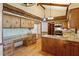 Kitchen featuring granite counters, custom wood cabinets and a unique paneled ceiling at 7620 Harps Mill Rd, Raleigh, NC 27615