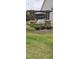 Stone community sign with well-manicured landscaping at 80 Nailsworth St, Angier, NC 27501