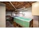 Unfinished basement featuring laundry sink and space for customization at 820 Runnymede Rd, Raleigh, NC 27607