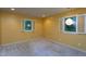 Bright, inviting bedroom with neutral carpet, plantation shutters, and recessed lighting at 820 Runnymede Rd Rd, Raleigh, NC 27607