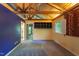 Bedroom with wooden ceiling beams and natural light provided by many windows at 820 Runnymede Rd Rd, Raleigh, NC 27607