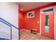 Bright entryway with vibrant colors, tiled floor, and modern design elements at 820 Runnymede Rd Rd, Raleigh, NC 27607