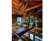 Stylish open interior with modern railings and windows showcasing outdoor scenery at 820 Runnymede Rd Rd, Raleigh, NC 27607