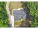 A bird's-eye view of the house's roof and manicured lawn with its driveway at 88 Priscilla Ln, Fuquay Varina, NC 27526