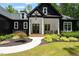 Welcoming front porch features seating, a walkway, and tasteful landscaping at 88 Priscilla Ln, Fuquay Varina, NC 27526