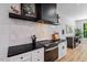 Well-equipped kitchen with stainless steel appliances, modern fixtures, and plenty of counter space at 88 Priscilla Ln, Fuquay Varina, NC 27526