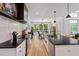 Beautiful kitchen with a large island, modern appliances, and an open layout to the dining area at 88 Priscilla Ln, Fuquay Varina, NC 27526
