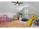 Spacious playroom with a variety of toys, natural light, and plenty of room for activities at 88 Priscilla Ln, Fuquay Varina, NC 27526