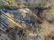 Aerial view of home showing driveway and trees at 947 Manchester Dr, Cary, NC 27511