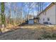 Spacious backyard with a shed and deck, offering potential for outdoor activities and storage at 947 Manchester Dr, Cary, NC 27511