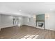 Finished basement with a modern fireplace and glass doors for ample natural light at 947 Manchester Dr, Cary, NC 27511