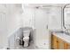 This bathroom includes a glass shower and a stylish vanity with a sink at 947 Manchester Dr, Cary, NC 27511