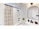Charming bathroom featuring a shower and tub combination, and vanity with a decorative mirror at 947 Manchester Dr, Cary, NC 27511