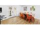 Bright dining room featuring a wood table, modern chairs, and ample natural light at 947 Manchester Dr, Cary, NC 27511