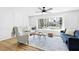 Bright living room featuring a large window, stylish seating, and modern décor at 947 Manchester Dr, Cary, NC 27511