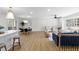 Open-concept living space with hardwood floors and an abundance of natural light at 947 Manchester Dr, Cary, NC 27511