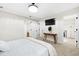 Cozy main bedroom with a ceiling fan and an ensuite bathroom and walk in closet at 947 Manchester Dr, Cary, NC 27511
