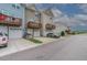 Charming townhomes featuring attached garages and cozy upper level wood balconies at 996 Tender Dr, Apex, NC 27502
