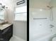 Bathroom vanity with granite countertop and tub with shower at 100 Upton Ct, Garner, NC 27529