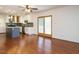 Bright, open kitchen with island, stainless appliances, and decorative backsplash at 100 Upton Ct, Garner, NC 27529