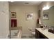Bathroom featuring soaking tub, vanity with sink, and decorative accents at 10411 Rosegate Court # 6, Raleigh, NC 27617